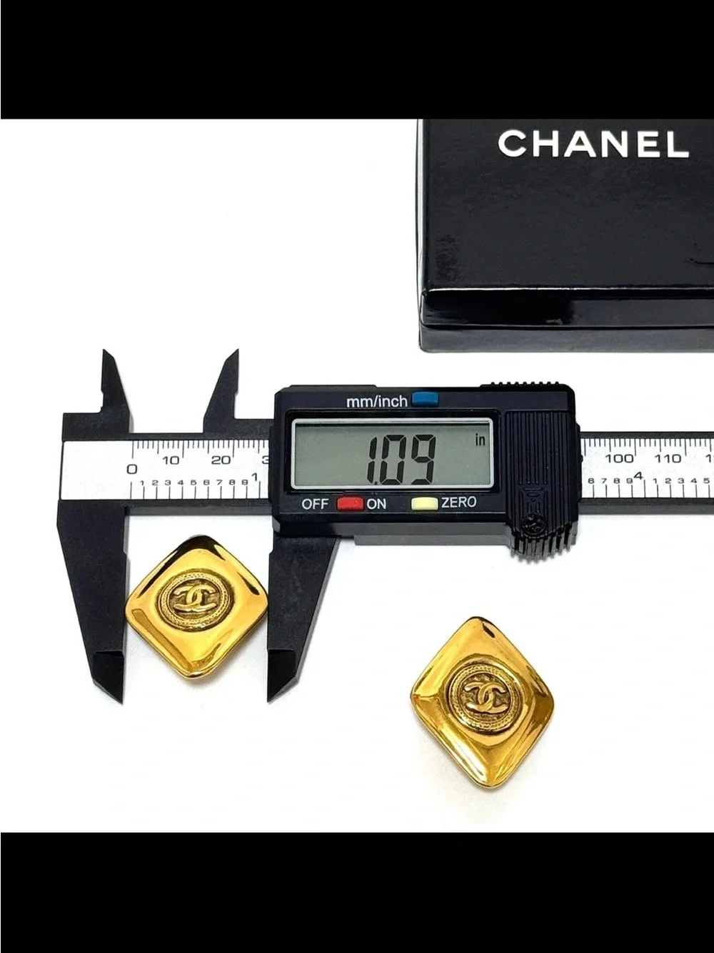 CHANEL Gold Tone Square CC Logo Clip Earrings. PREOWNED.